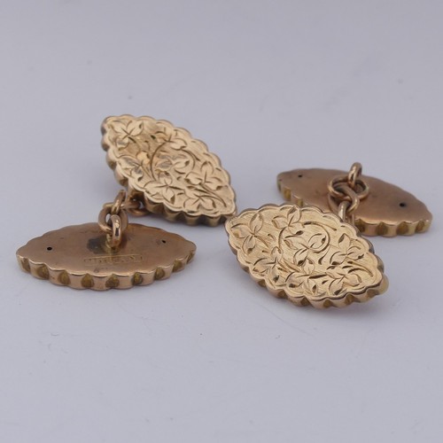 366 - A pair of 9ct rose gold hollow Cufflinks, textured navette fronts and reverses with engraved decorat... 