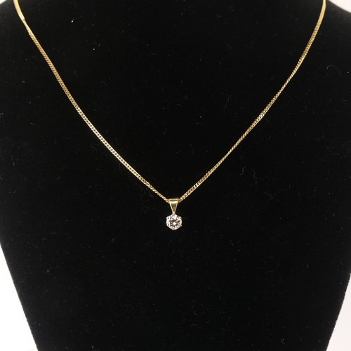 265 - A diamond solitaire Pendant, the brilliant cut stone approx. 0.2ct, on a 9ct yellow gold trace chain... 