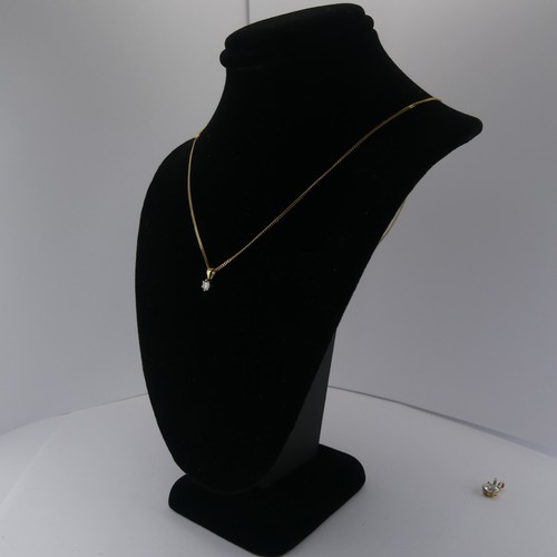 265 - A diamond solitaire Pendant, the brilliant cut stone approx. 0.2ct, on a 9ct yellow gold trace chain... 