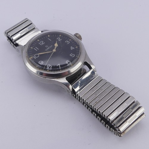 137 - A British military issue Omega Pilot's Wristwatch, the black dial with white lettering, luminous han... 