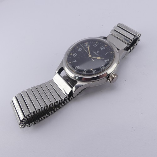 137 - A British military issue Omega Pilot's Wristwatch, the black dial with white lettering, luminous han... 