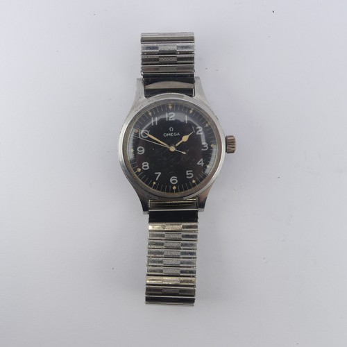 137 - A British military issue Omega Pilot's Wristwatch, the black dial with white lettering, luminous han... 