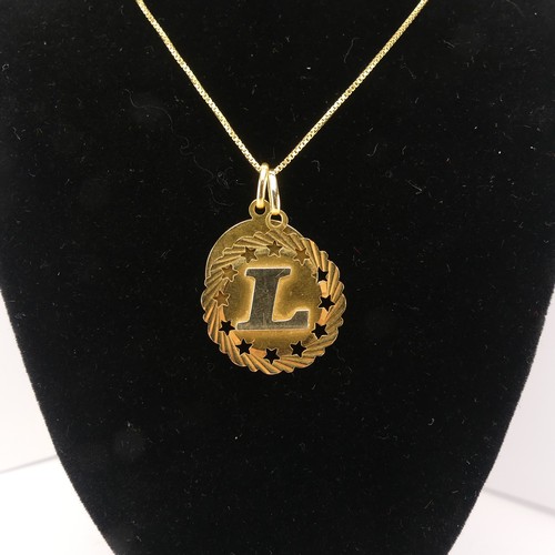 375 - An 18ct yellow gold 'Gemini' Zodiac Pendant, together with an 18ct gold pendant initialled 'L' and a... 