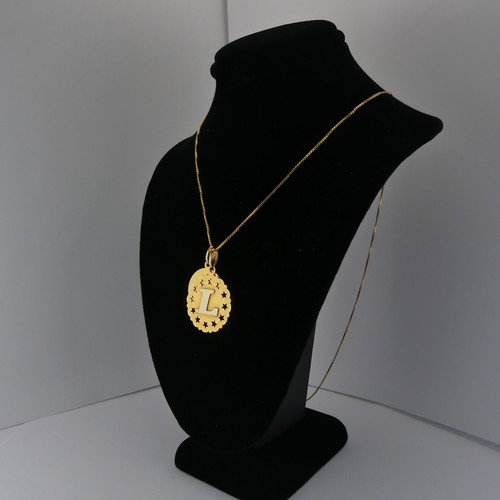 375 - An 18ct yellow gold 'Gemini' Zodiac Pendant, together with an 18ct gold pendant initialled 'L' and a... 