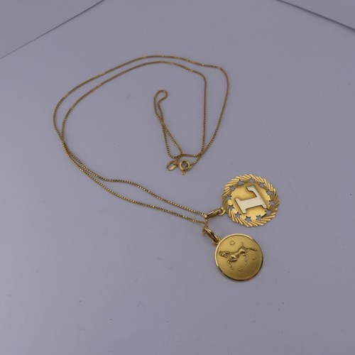 375 - An 18ct yellow gold 'Gemini' Zodiac Pendant, together with an 18ct gold pendant initialled 'L' and a... 