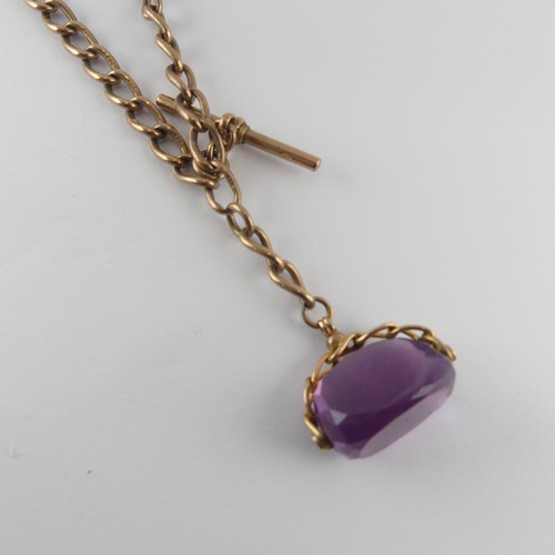 268 - A 9ct gold curb link double Watch Chain, with replacement metal clips and with amethyst swivel fob s... 