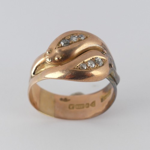 178 - An antique 9ct rose gold double snake Ring, the snake heads each set three graduated old cut diamond... 