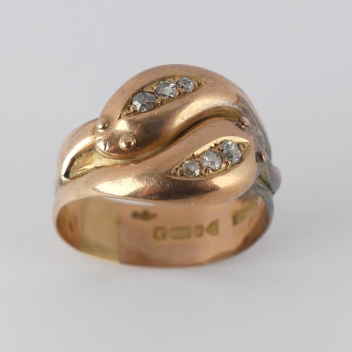 178 - An antique 9ct rose gold double snake Ring, the snake heads each set three graduated old cut diamond... 