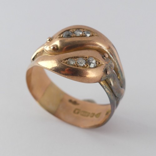 178 - An antique 9ct rose gold double snake Ring, the snake heads each set three graduated old cut diamond... 