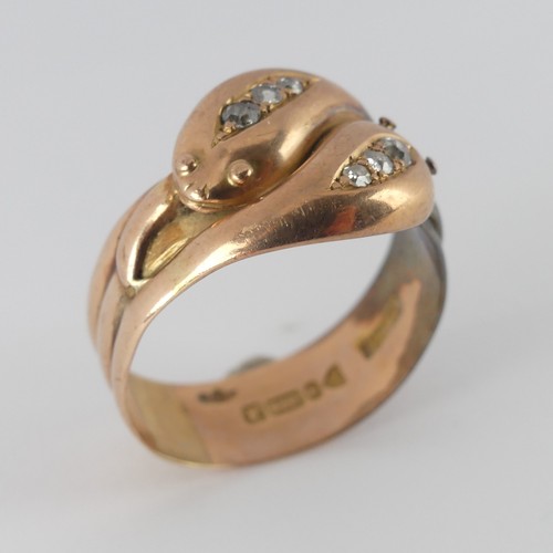 178 - An antique 9ct rose gold double snake Ring, the snake heads each set three graduated old cut diamond... 