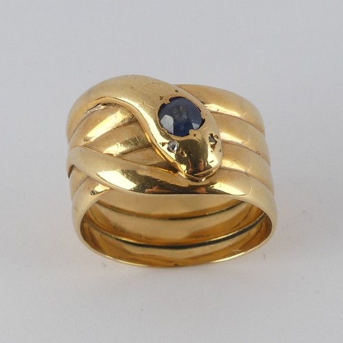 179 - A late Victorian 18ct yellow gold coiled snake Ring, the head set with a facetted sapphire, approx. ... 