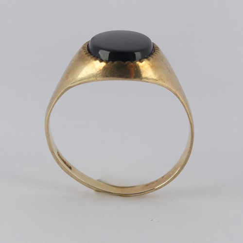 180 - A 9ct yellow gold Signet Ring, the front set oval black onxy, Size V, 3.5g.