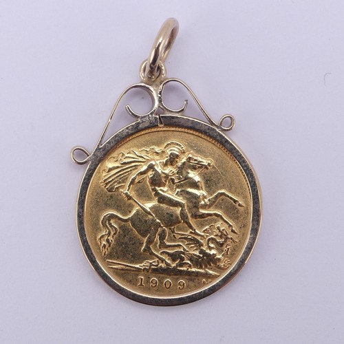 417 - An Edwardian gold Half Sovereign, dated 1909, in 9ct gold pendant mount, 5.2g.