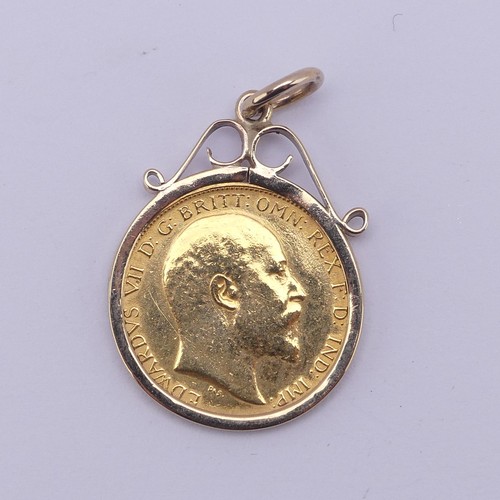 417 - An Edwardian gold Half Sovereign, dated 1909, in 9ct gold pendant mount, 5.2g.