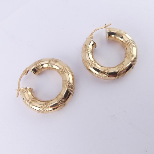 327 - A pair of 9ct yellow gold hollow hoop Earrings, 25mm diameter, 4.2g.