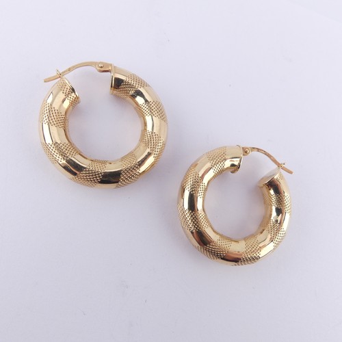 327 - A pair of 9ct yellow gold hollow hoop Earrings, 25mm diameter, 4.2g.