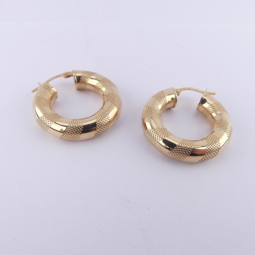 327 - A pair of 9ct yellow gold hollow hoop Earrings, 25mm diameter, 4.2g.