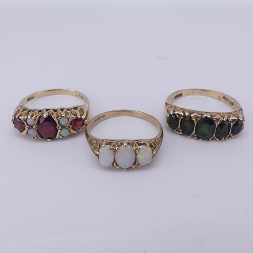 184 - An antique style garnet and opal Ring, mounted in 9ct yellow gold, Size Q½, together with a g... 