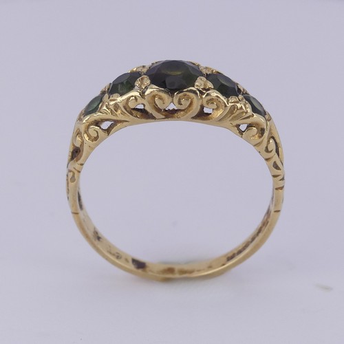 185 - An antique style graduated five stone tourmaline Ring, the centre stone approx. 5.5mm diameter, moun... 