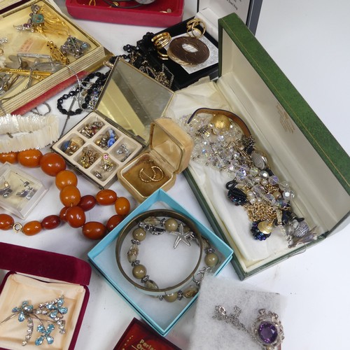 386 - A quantity of Costume Jewellery, including a string of faux butterscotch amber beads, other bead nec... 