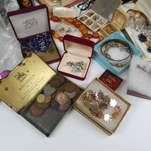 386 - A quantity of Costume Jewellery, including a string of faux butterscotch amber beads, other bead nec... 