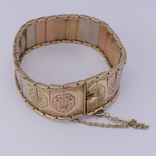 300 - A 9ct tri-colour gold Bracelet, the flexible rectangular links with foliate decoration, integral box... 