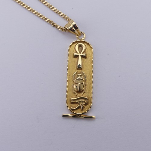 271 - An 18ct yellow gold Egyptian Pendant, of typical design with hieroglyphs front and reverse, 4.2cm lo... 