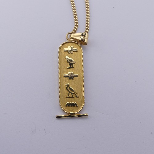 271 - An 18ct yellow gold Egyptian Pendant, of typical design with hieroglyphs front and reverse, 4.2cm lo... 