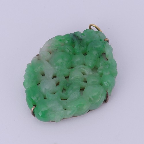 272 - A Chinese Jade Pendant, carved and pierced with a rodent amongst foliage and flowers, unmarked yello... 