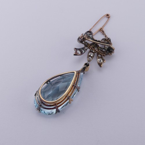 273 - An Edwardian Belle Epoque aquamarine and diamond Brooch, the pear shaped facetted aquamarine, approx... 