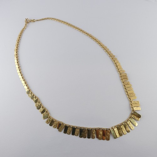 274 - A 9ct yellow gold 'Cleopatra' style fringe Necklace, 42cm long, 6.8g.