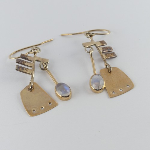 331 - A pair of 9ct yellow gold and moonstone drop Earrings, of abstract design with collet set oval moons... 