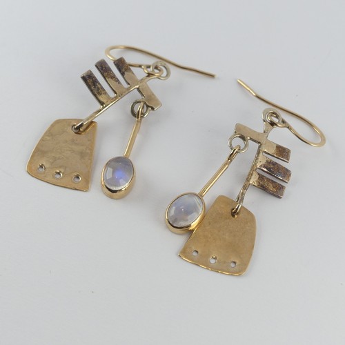 331 - A pair of 9ct yellow gold and moonstone drop Earrings, of abstract design with collet set oval moons... 