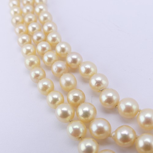 276 - A triple row of graduated cultured Pearls, largest 8.8mm, on a smart seed pearl set 9ct gold snap, 4... 