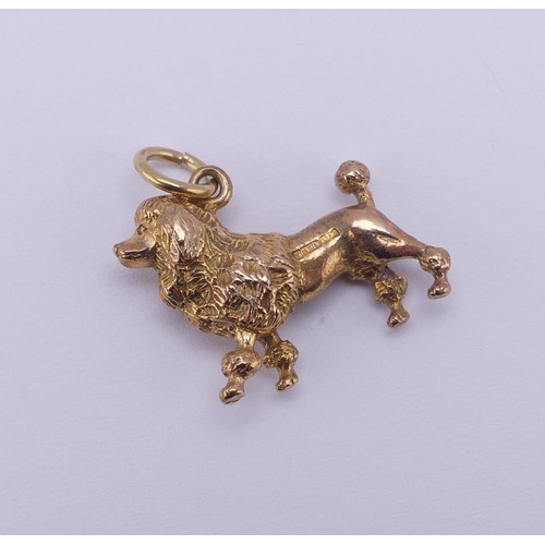 400 - A 9ct yellow gold Poodle Charm, hallmarked  Birmingham 1959, 4.9g.