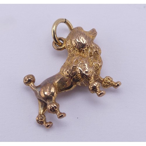 400 - A 9ct yellow gold Poodle Charm, hallmarked  Birmingham 1959, 4.9g.