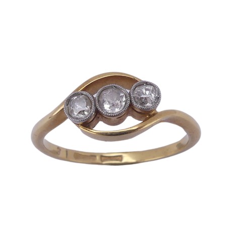 209 - A three stone diamond Ring, the old cut stones millegrain set in 18ct yellow gold and platinum, appr... 