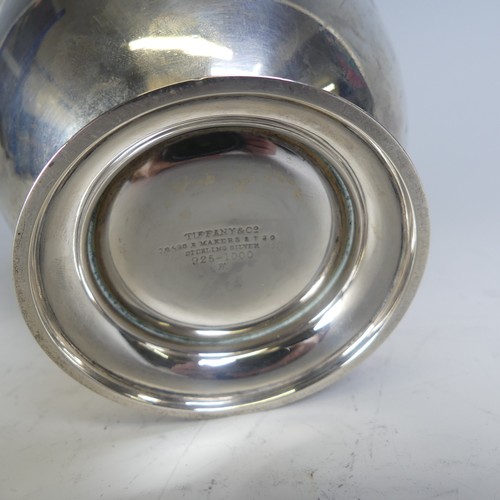 100 - Tiffany & Co.; An Art Deco silver Sugar Basket, of circular form, the swing handle with reeded d... 