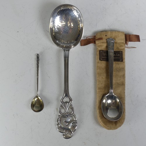 101 - A Norwegian silver Spoon, marked 'NM 830S', with squirrel finial and hammered bowl, 23cm long, toget... 