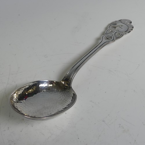 101 - A Norwegian silver Spoon, marked 'NM 830S', with squirrel finial and hammered bowl, 23cm long, toget... 