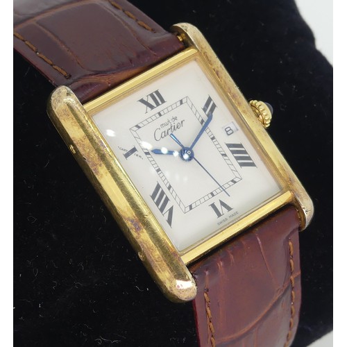 142 - A Must de Cartier silver gilt quartz Tank Calendar Wristwatch, model ref: 2413, ivory coloured dial ... 