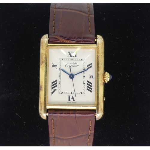 142 - A Must de Cartier silver gilt quartz Tank Calendar Wristwatch, model ref: 2413, ivory coloured dial ... 