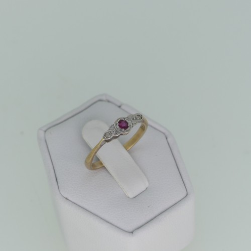 406 - A small ruby and diamond Ring, mounted in 9ct yellow gold, Size O, together with a cubic zirconia si... 