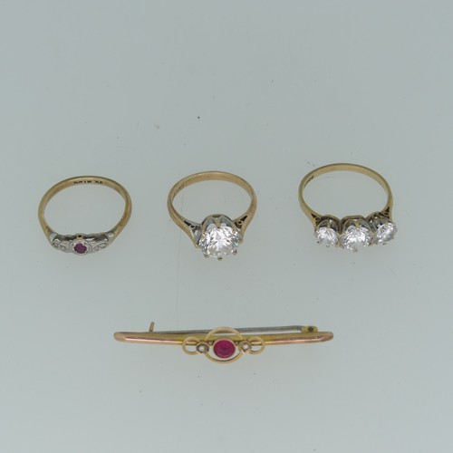 406 - A small ruby and diamond Ring, mounted in 9ct yellow gold, Size O, together with a cubic zirconia si... 