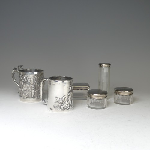 100A - An early 20thC Eastern silver Mug, possibly Chinese / Burmese, the base marked 'T.P. 90', with conti... 