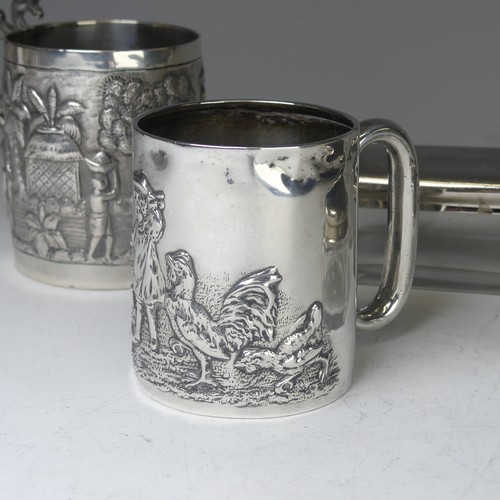 100A - An early 20thC Eastern silver Mug, possibly Chinese / Burmese, the base marked 'T.P. 90', with conti... 