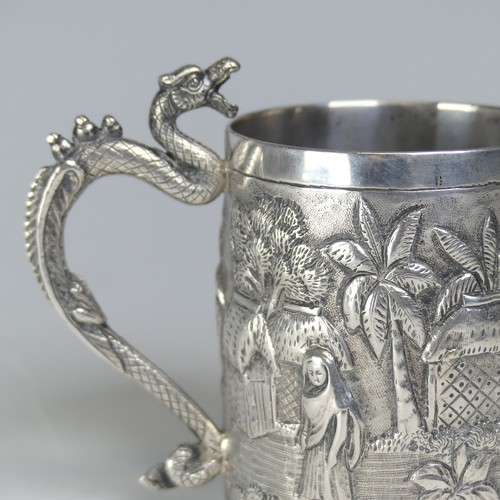 100A - An early 20thC Eastern silver Mug, possibly Chinese / Burmese, the base marked 'T.P. 90', with conti... 