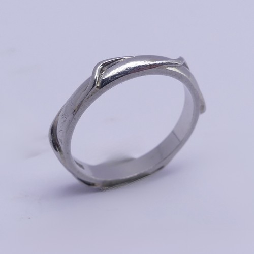 171 - A Platinum Wedding Band, of hexagonal form, Size N, 5.2g.