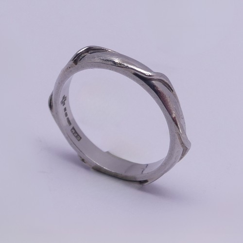 171 - A Platinum Wedding Band, of hexagonal form, Size N, 5.2g.