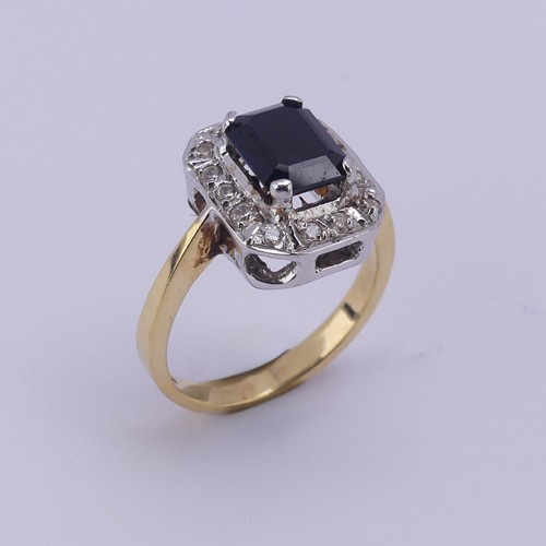 201 - A sapphire and diamond cluster Ring, the emerald cut sapphire approx. 1.5ct, four claw set in white ... 